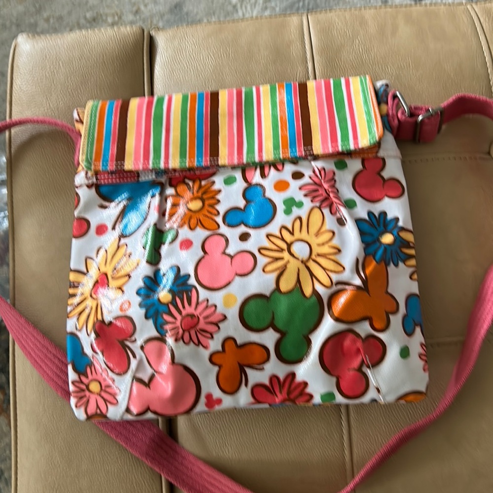 Disney’s Mickey Crossbody bag very colorful and has inside pockets